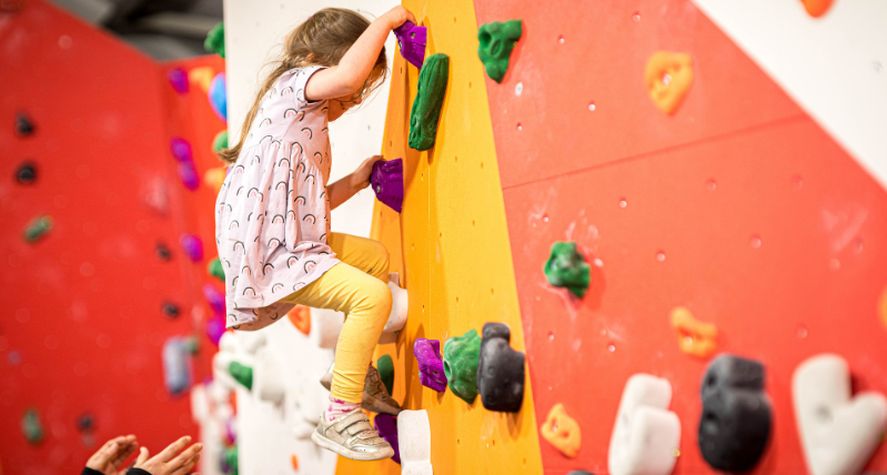 Child climbing at The Arc